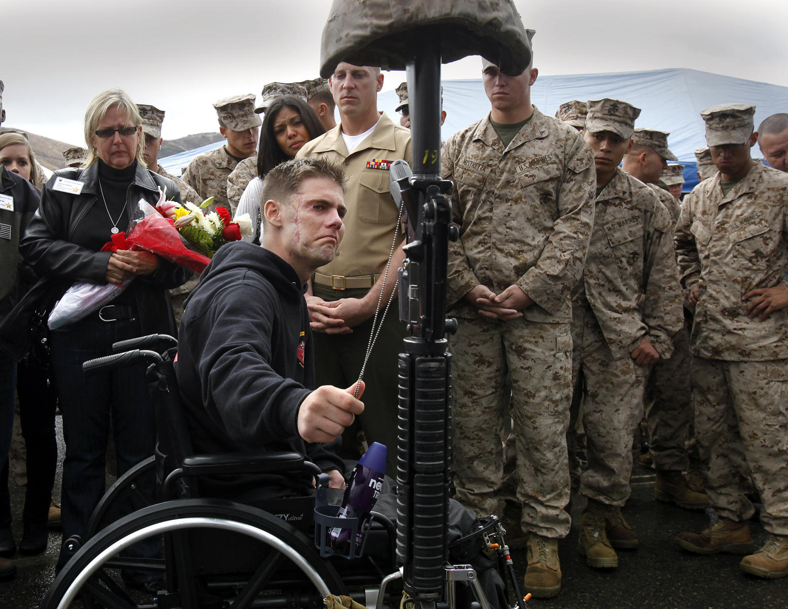 Injured Marine who came to pay respect to his fallen comrades, Camp Pendleton, CA