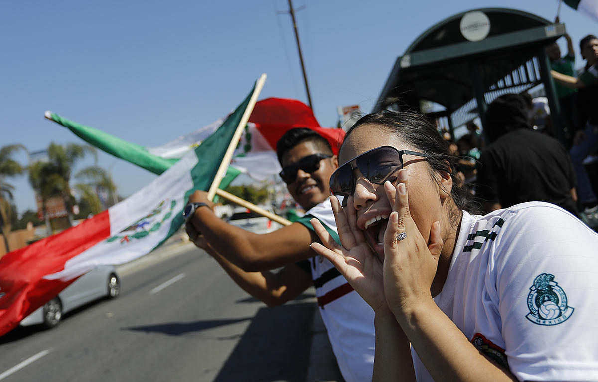 National City Mexican-Americans celebrate as Mexico advances in World Cup soccer. 