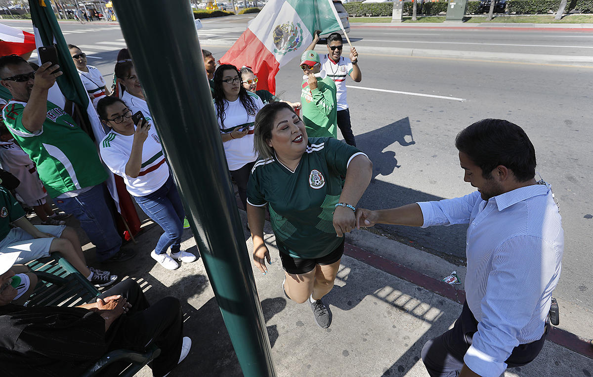 National City Mexican-Americans celebrate as Mexico advances in World Cup soccer.  : On Assignment : Corporate and Event Photographer