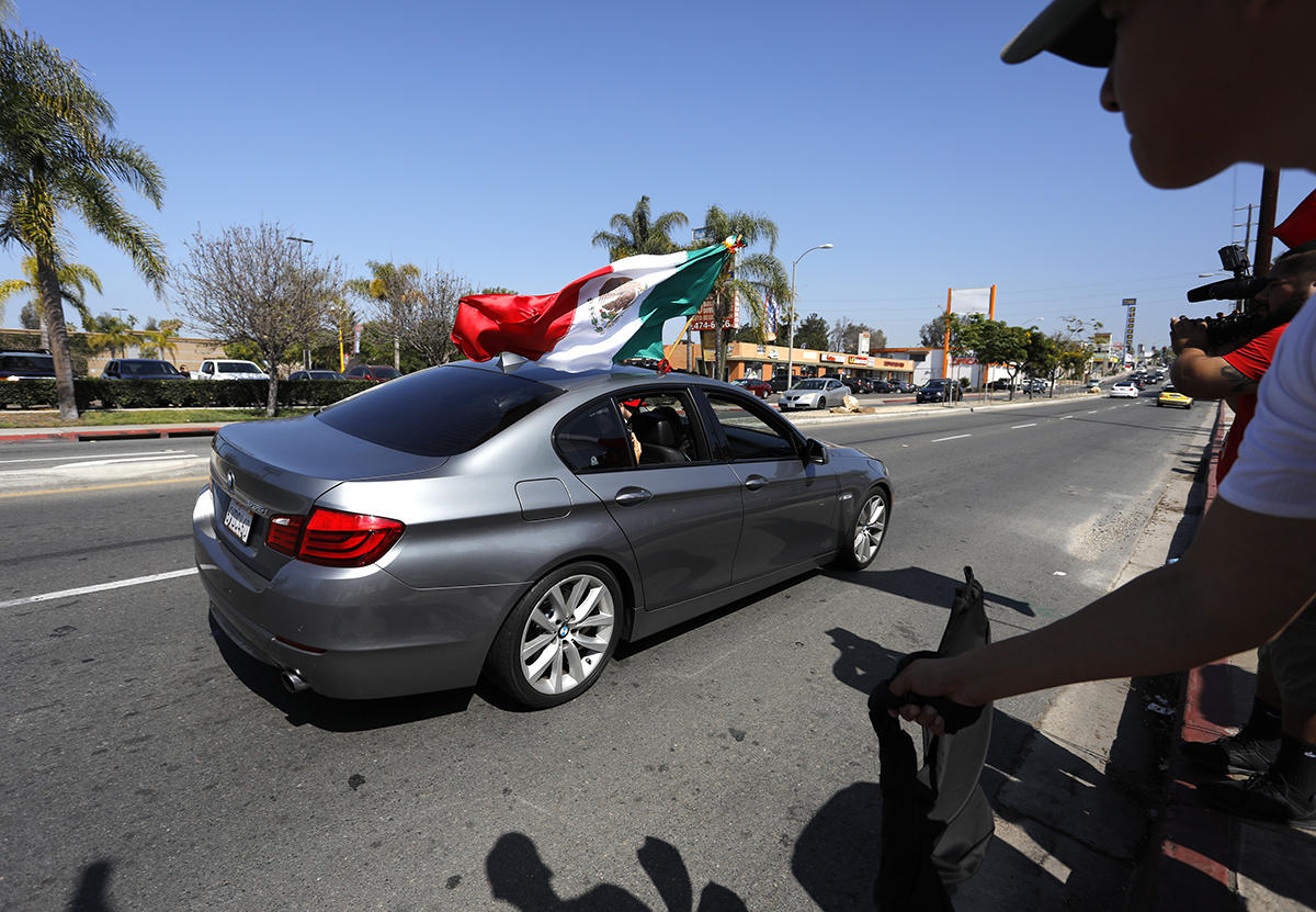 National City Mexican-Americans celebrate as Mexico advances in World Cup soccer. 