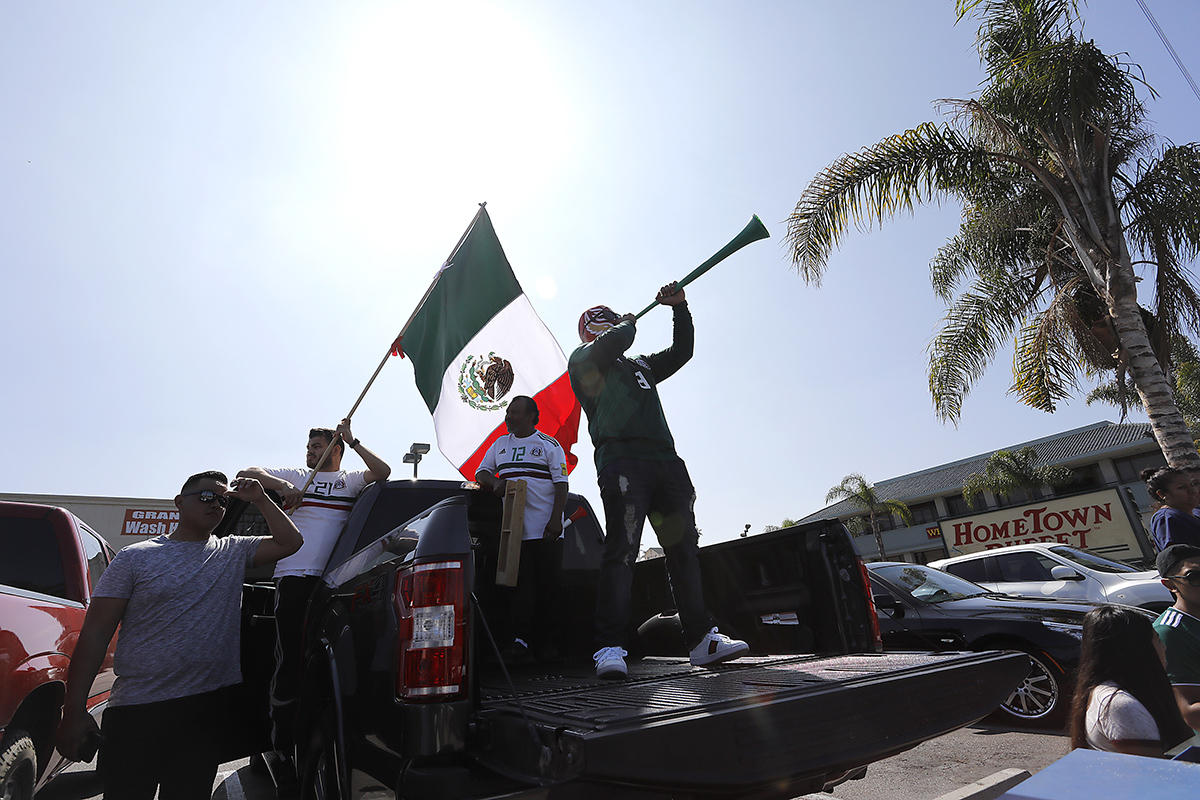 National City Mexican-Americans celebrate as Mexico advances in World Cup soccer. 