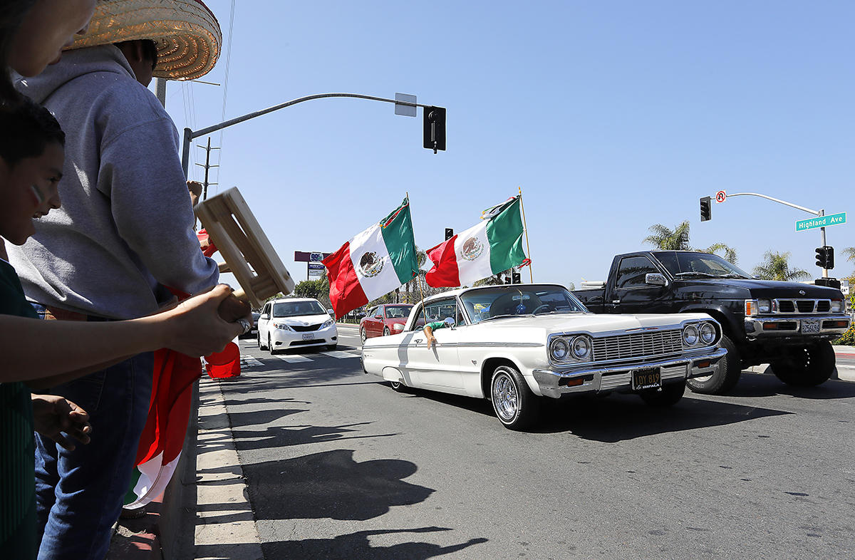 National City Mexican-Americans celebrate as Mexico advances in World Cup soccer. 