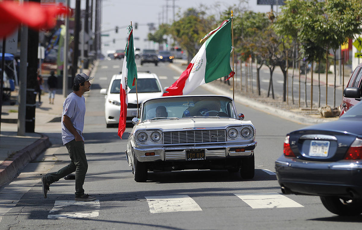 National City Mexican-Americans celebrate as Mexico advances in World Cup soccer. 