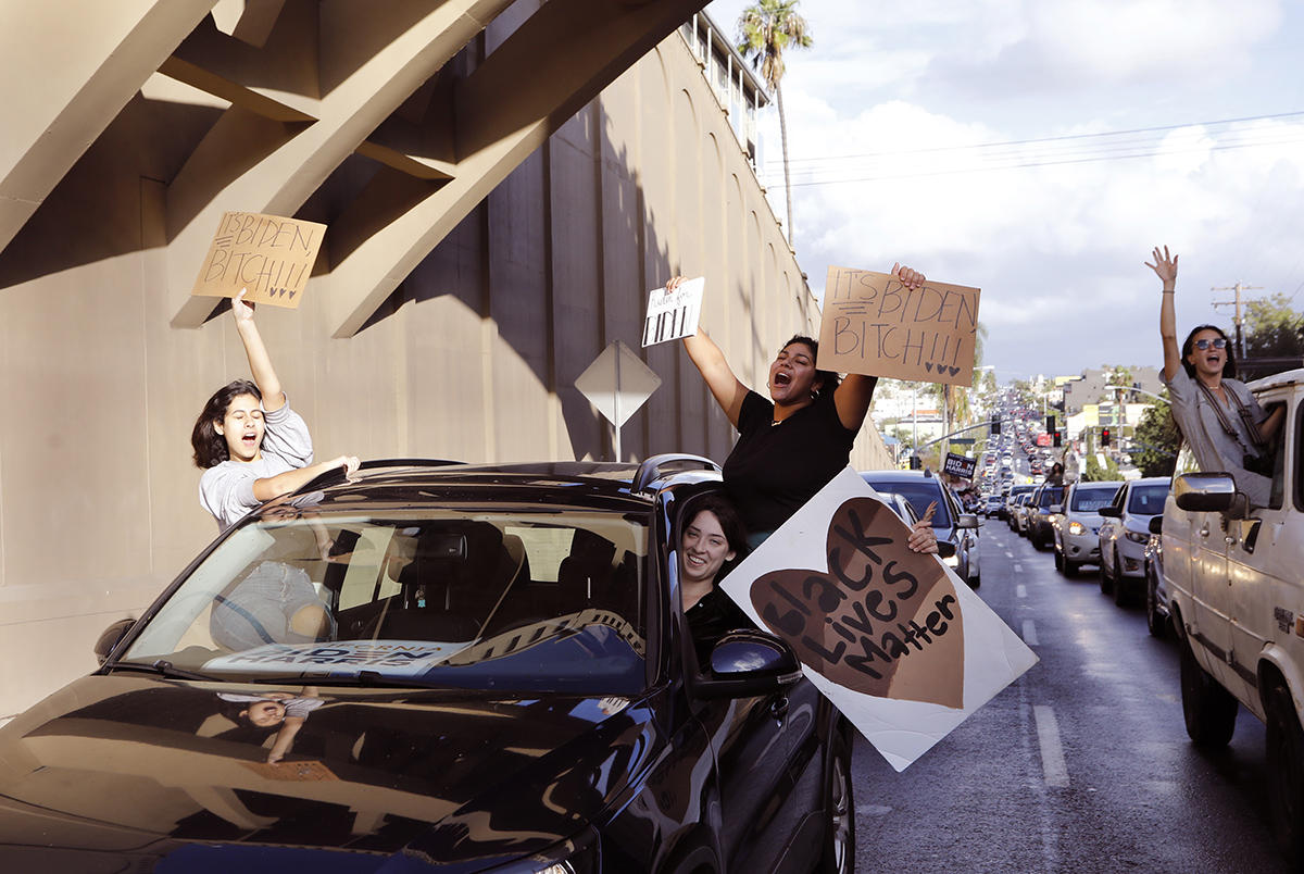 Election results brought out miles of happy Biden supporters and not-so-happy Trump supporters all over San Diego.  